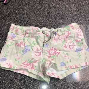 Mossimo floral and beige shorts.